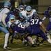 Skyline Sophomore quarterback Askaree Crawford is tackled by Pioneer linebacker Tyler Jackson on Friday. Pioneer leads at half 37-0. Daniel Brenner I AnnArbor.com